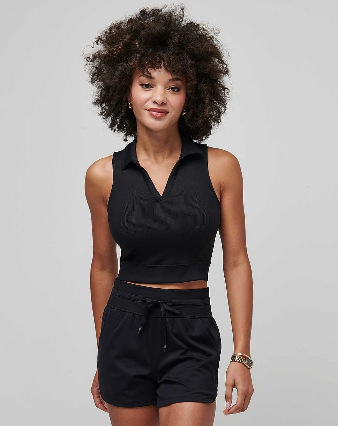 TravisMathew Polos>Moveknit Sleeveless Vneck Polo