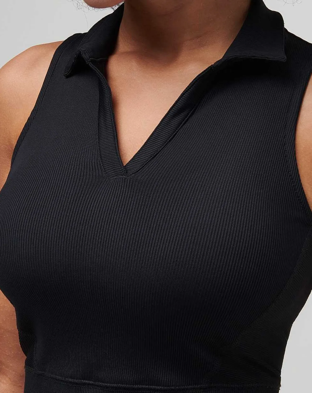 TravisMathew Polos>Moveknit Sleeveless Vneck Polo