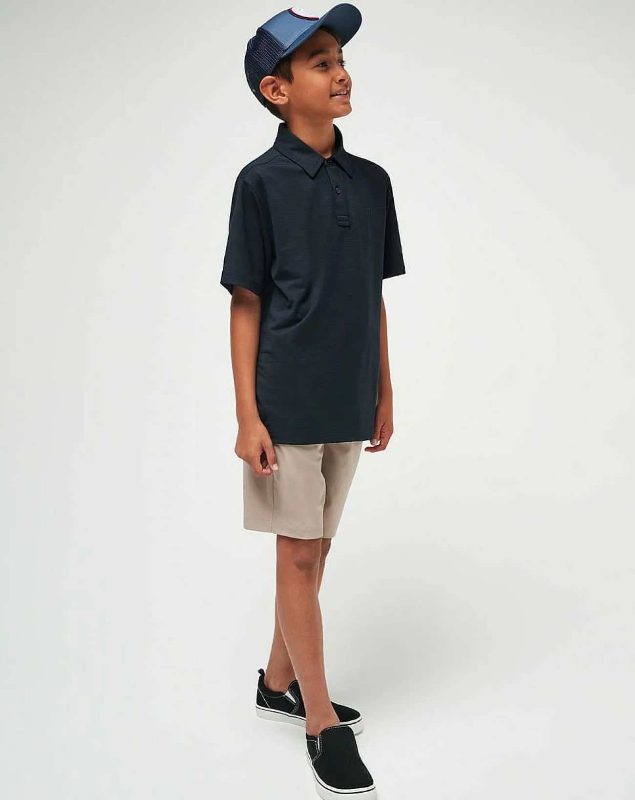 TravisMathew Youth Tops>The Heater Youth Polo