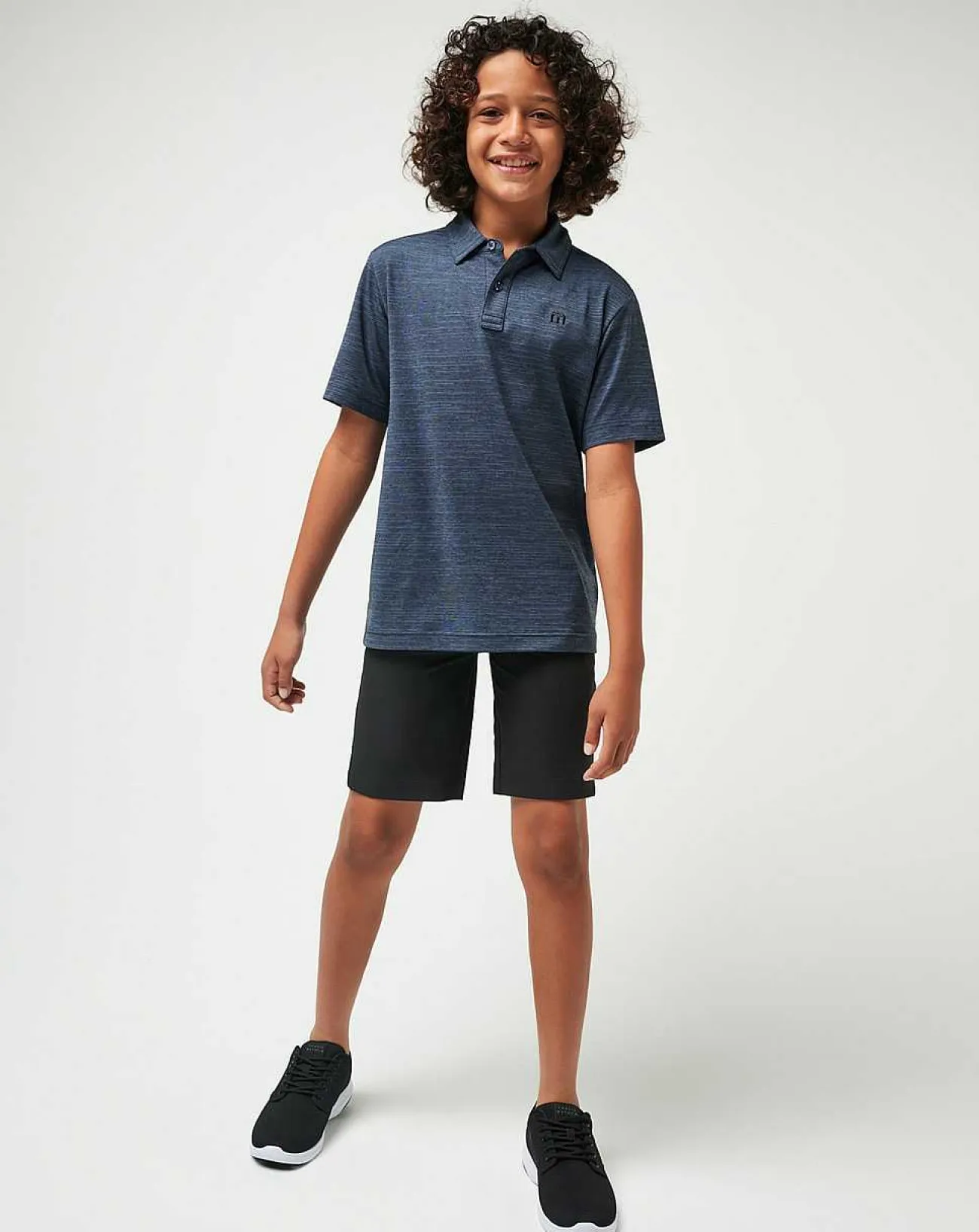 TravisMathew Youth Tops>The Heater Youth Polo