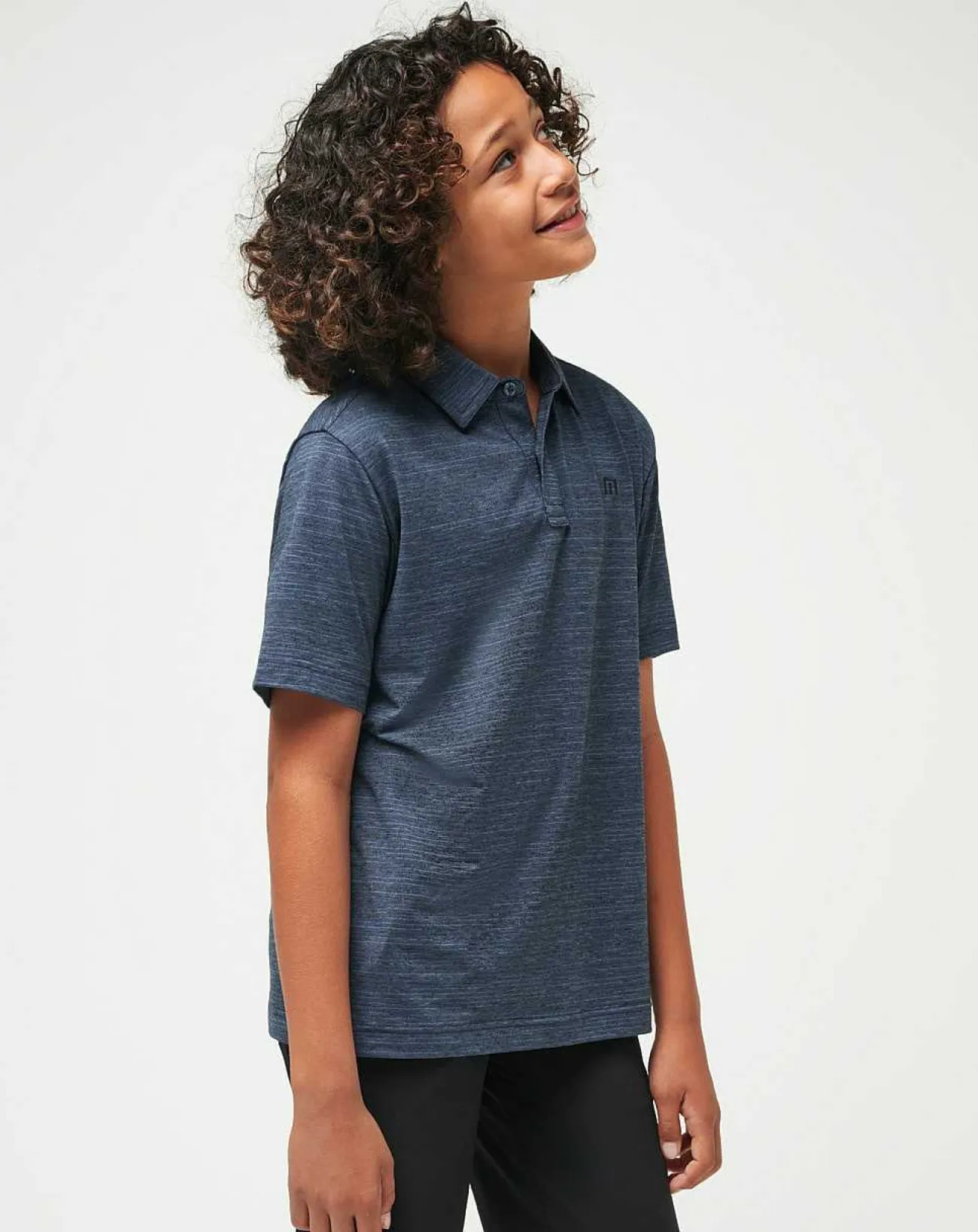 TravisMathew Youth Tops>The Heater Youth Polo